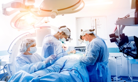 spinal-surgery-group-surgeons-operating-room-with-surgery-equipment